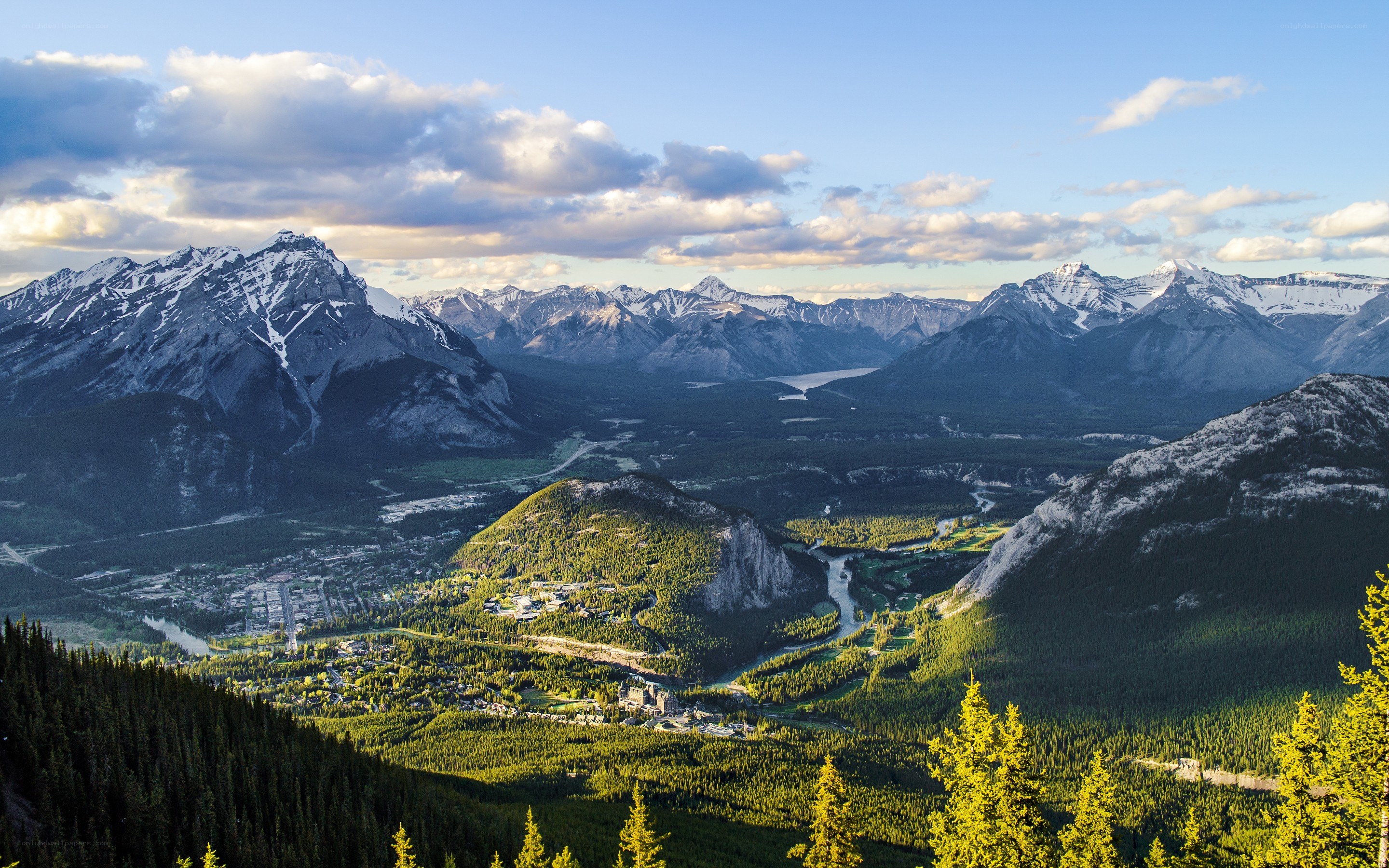 Mountain valley with town and river