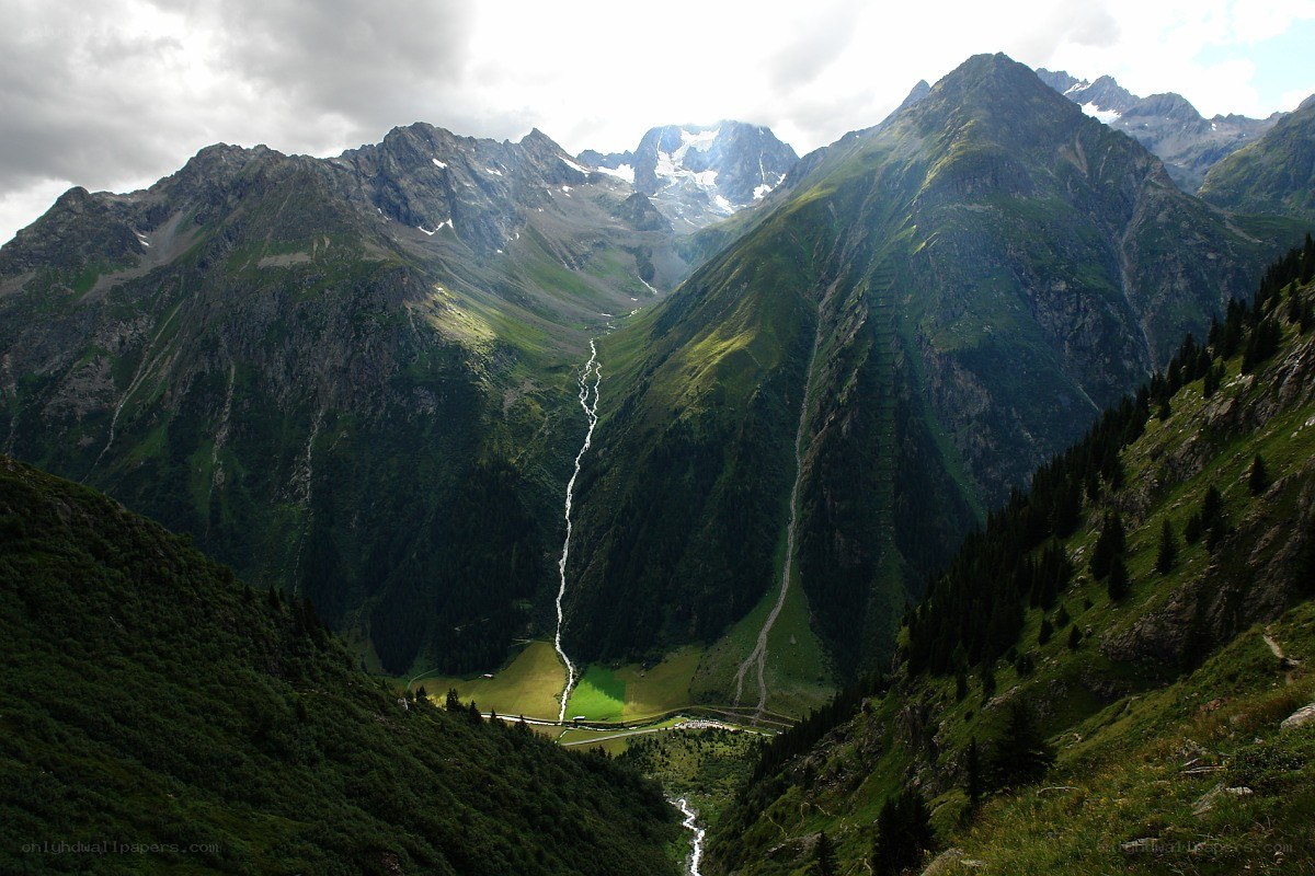 Mountain valley with waterfall