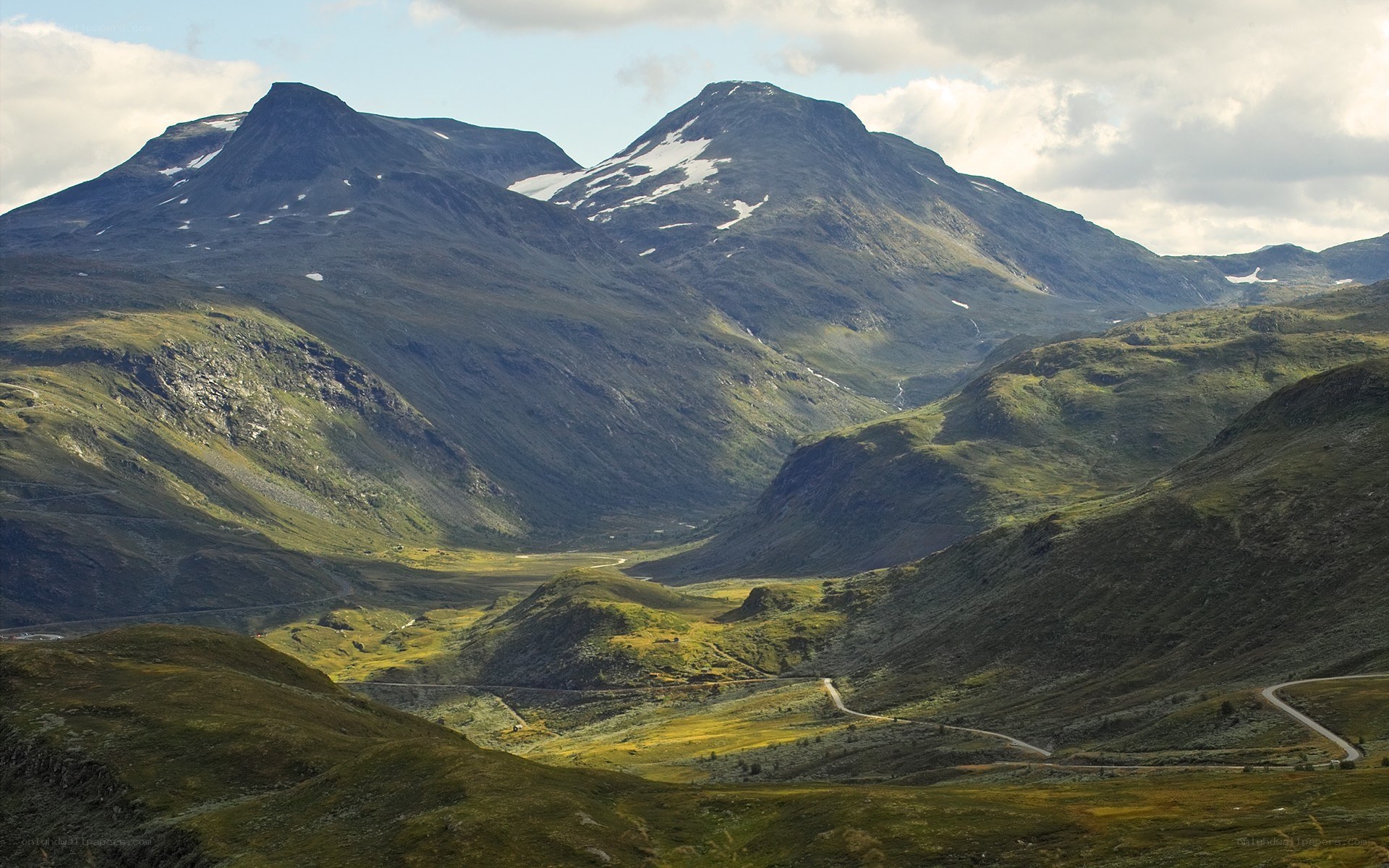 Mountain valley with winding road
