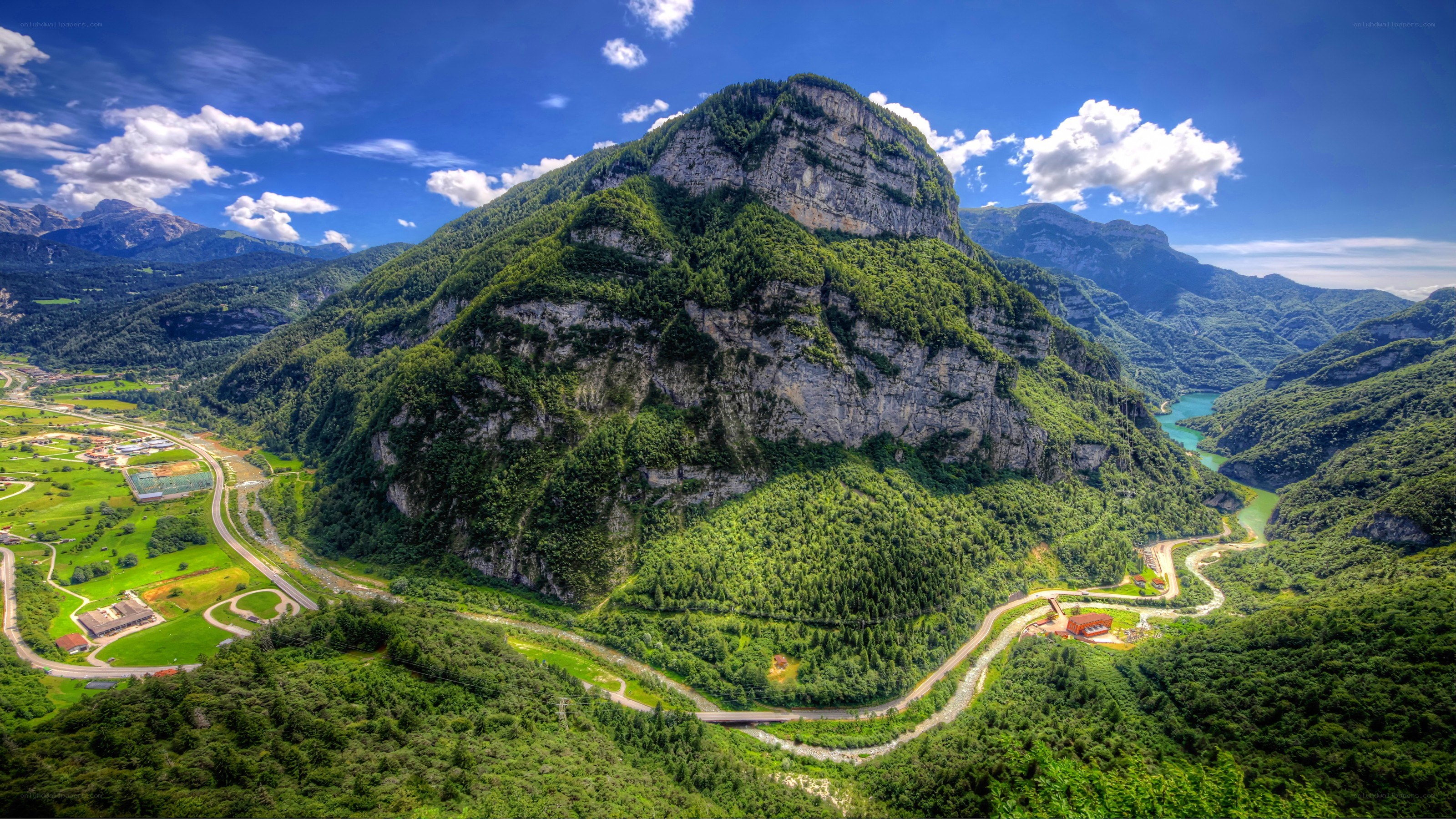 Mountain valley with winding roads