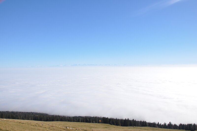 Mountain View Above Clouds — Blue