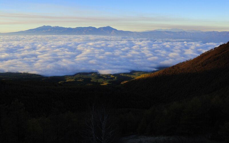 Mountain view above sea of clouds