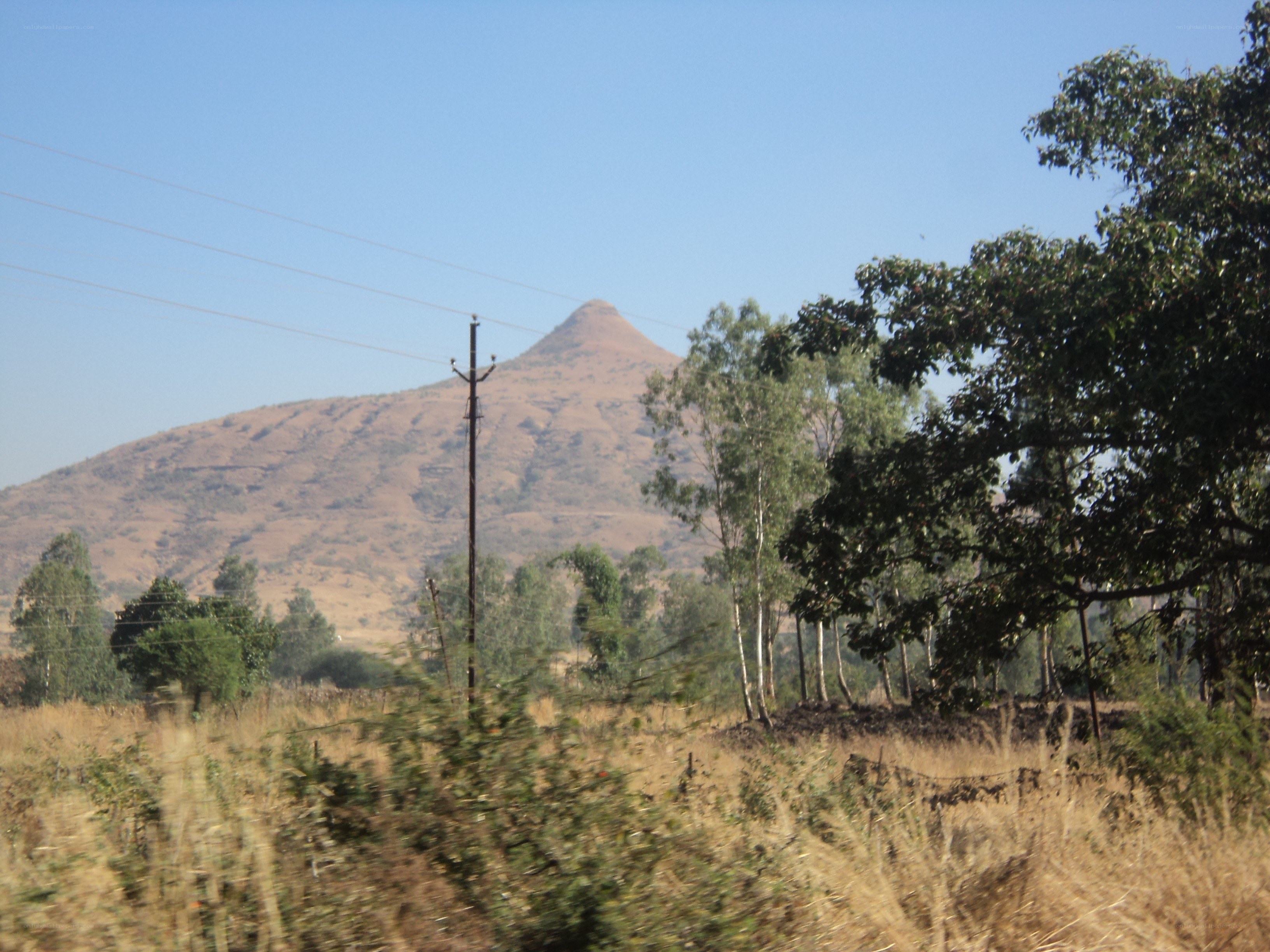 Mountain view with power lines