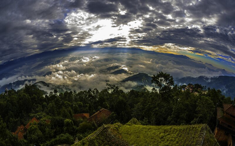 Mountain Village Above Clouds
