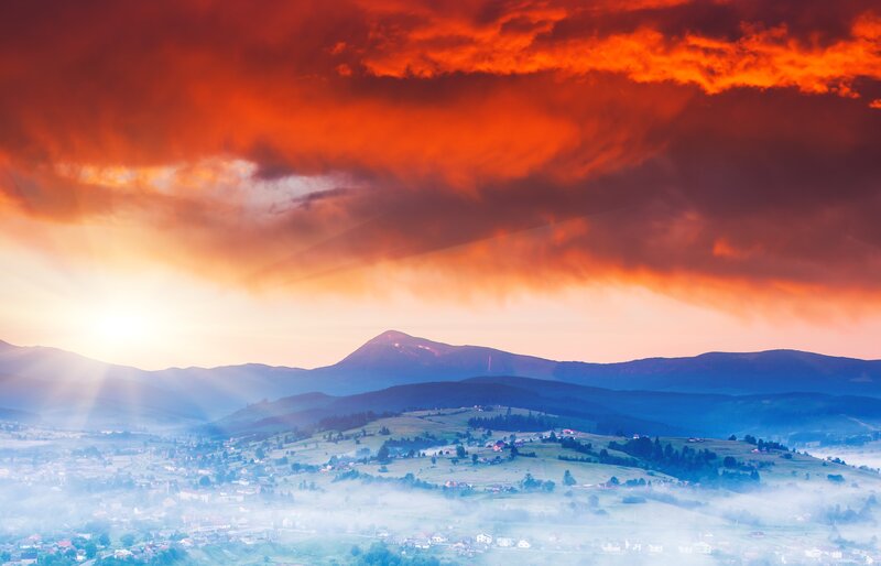 Mountain Village at Sunrise — Orange, Dramatic