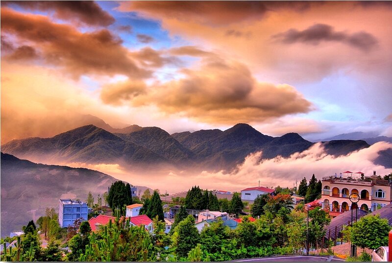 Mountain Village at Sunrise — Orange