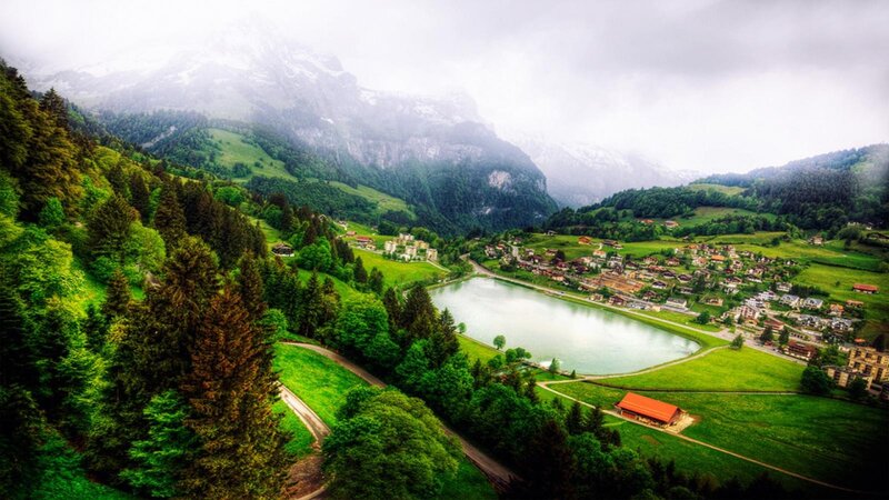 mountain village by a lake