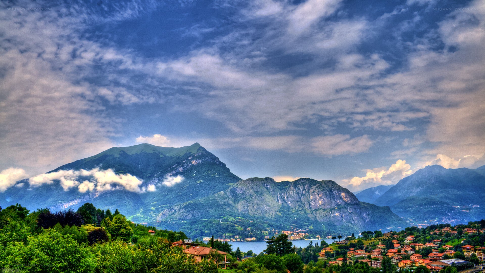 mountain village by a lake