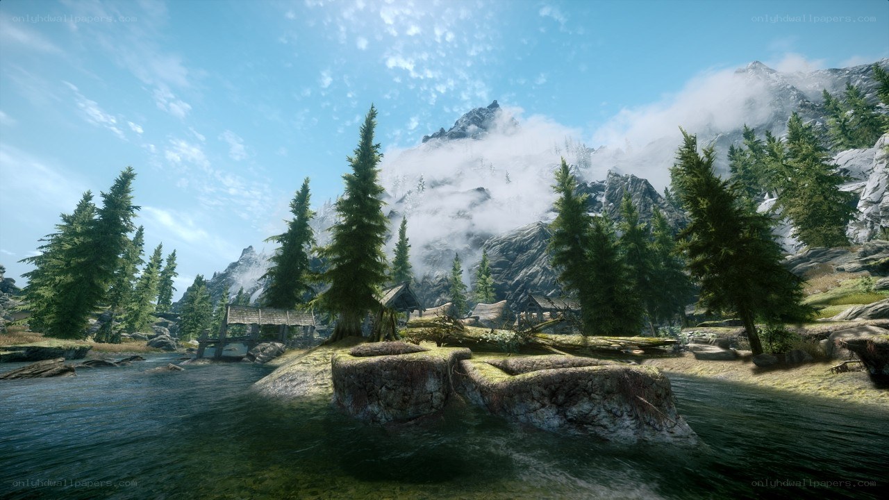 mountain village by a river