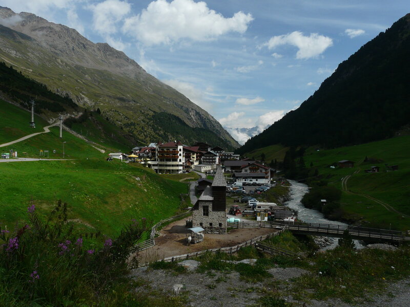 mountain village by river