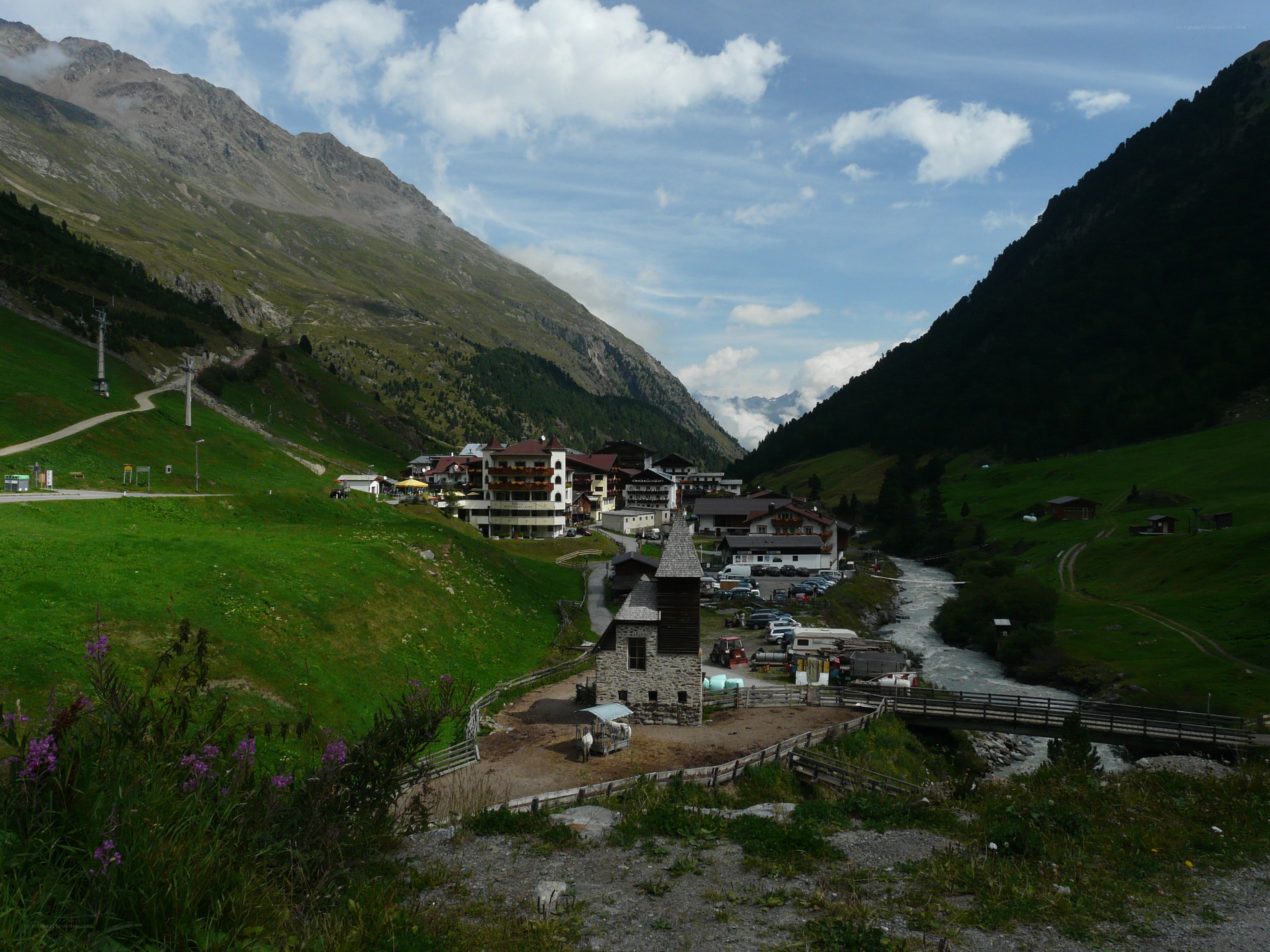 mountain village by river