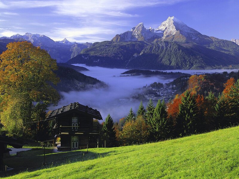 Mountain village in autumn mist