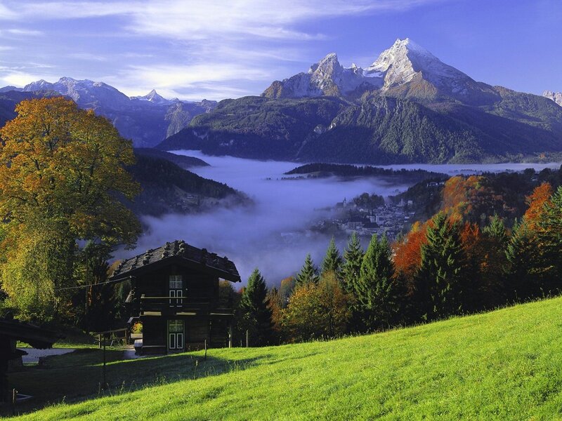 Mountain village in autumn mist