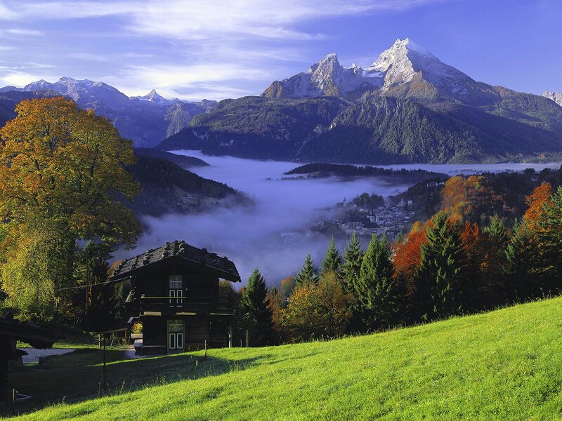 Mountain village in autumn mist