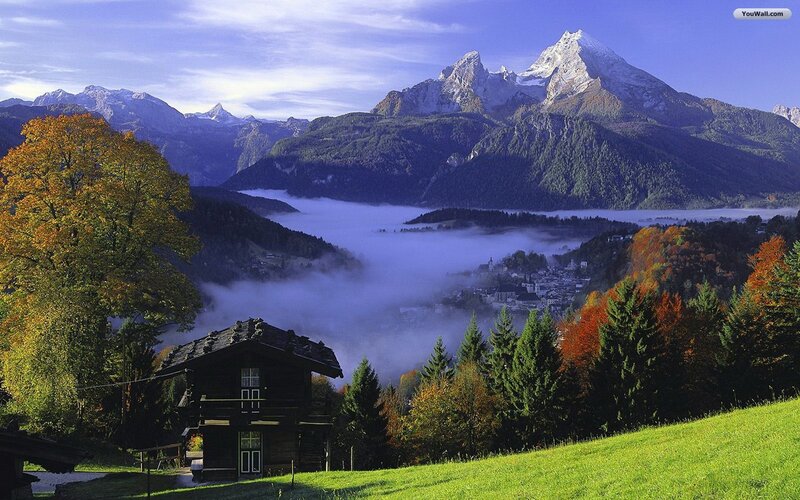 Mountain village in autumn mist