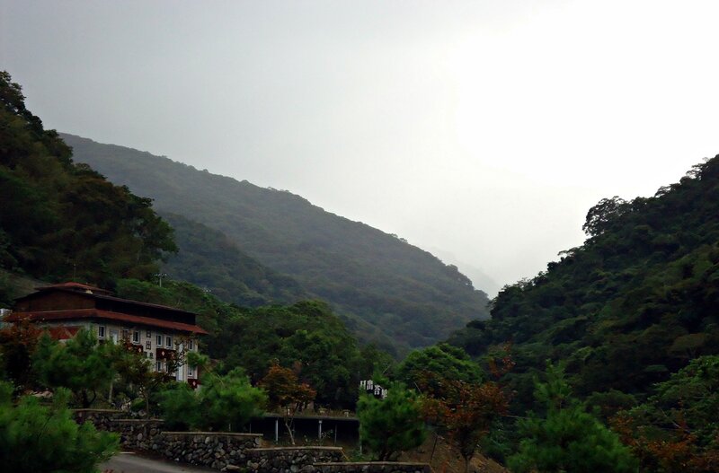 Mountain village in misty weather