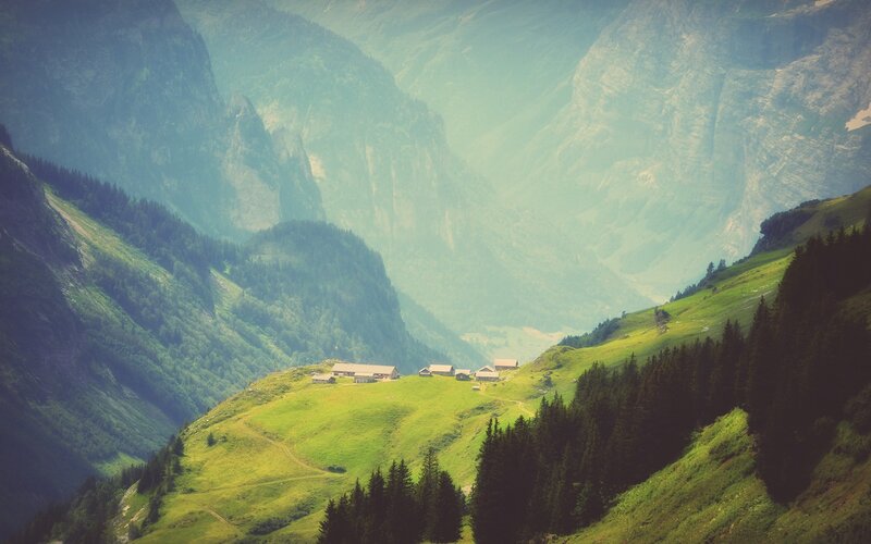 Mountain Village in Valley — Green, Serene, Afternoon, Photograph, Huts