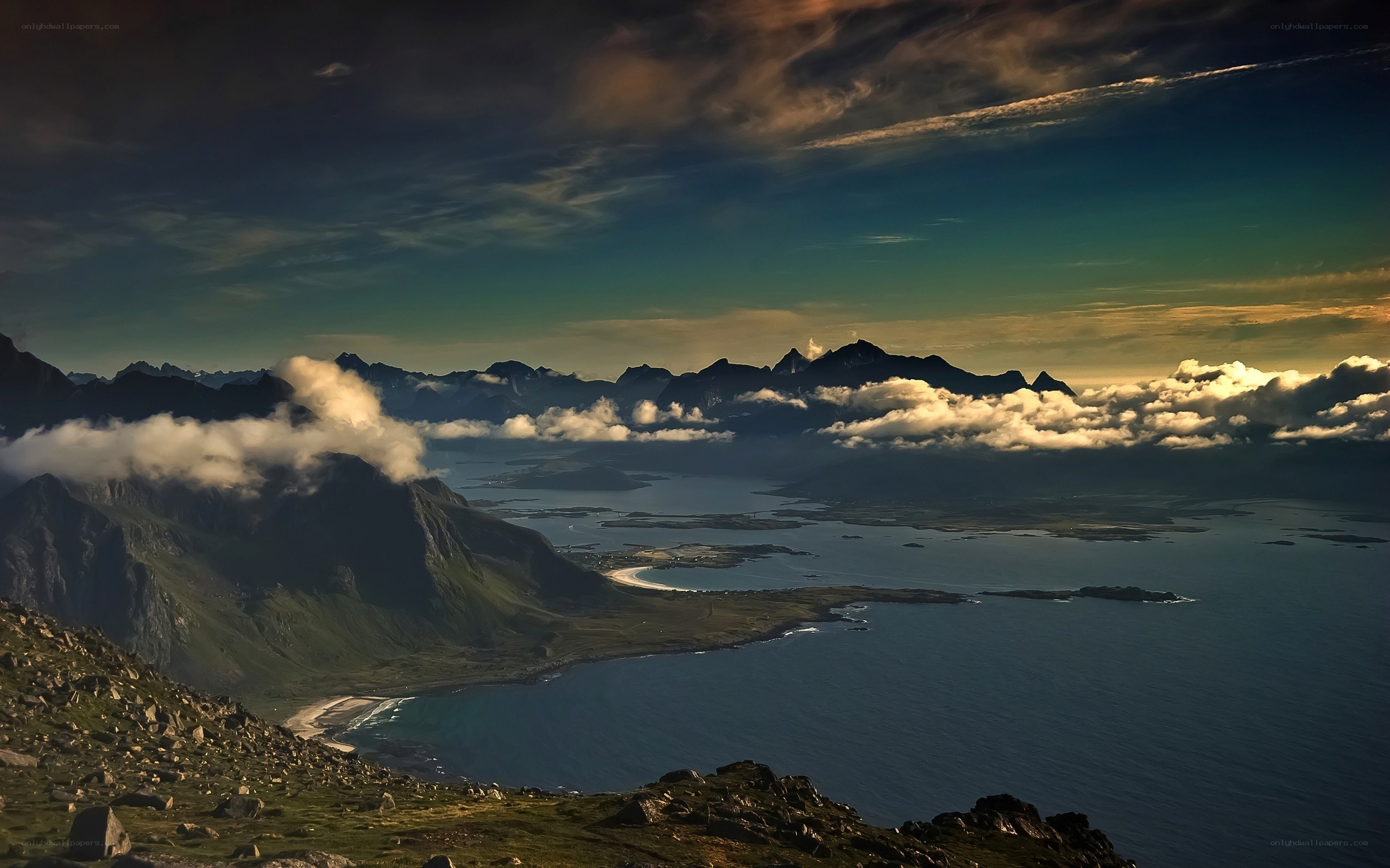 Mountainous coastal landscape at dusk