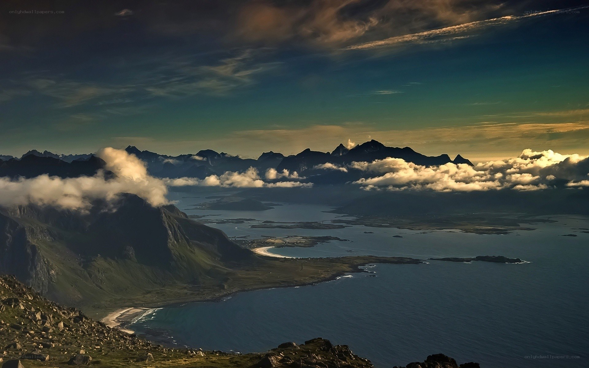 Mountainous coastal landscape at sunset