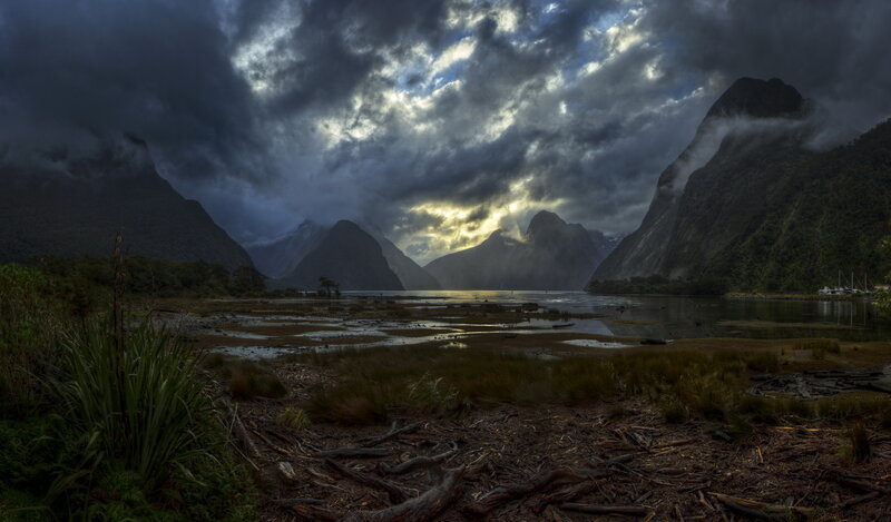 Mountainous Fjord Landscape — Gray, Dramatic, Sunset