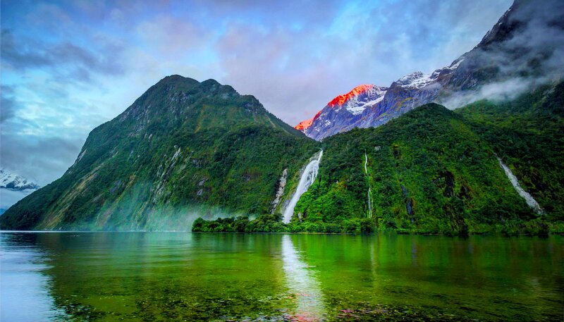 Mountainous Fjord Landscape — Green, Dramatic, Sunset