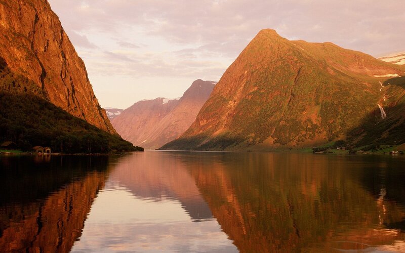 Mountainous Fjord Landscape — Orange, Serene, Sunset
