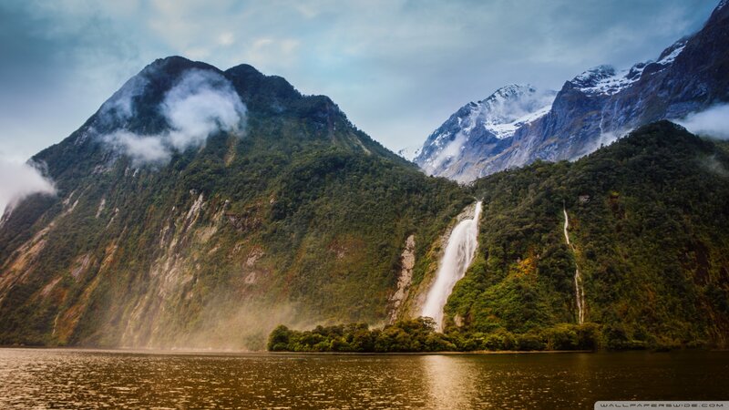 Mountainous Fjord with Waterfall