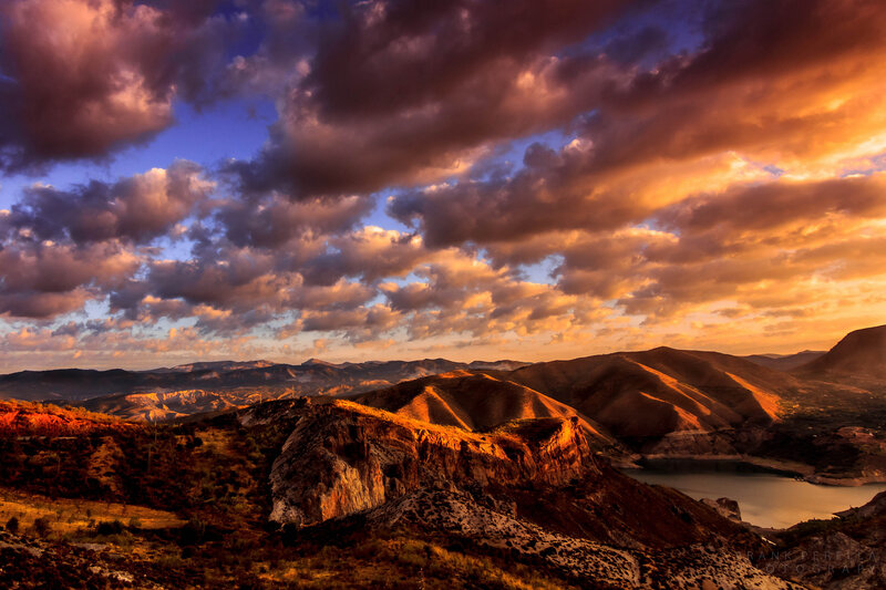 Mountainous Landscape at Sunset — Orange, Dramatic, Photograph