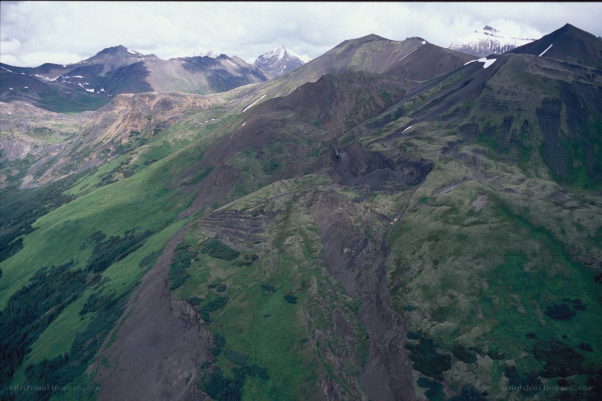 mountainous landscape with green slopes