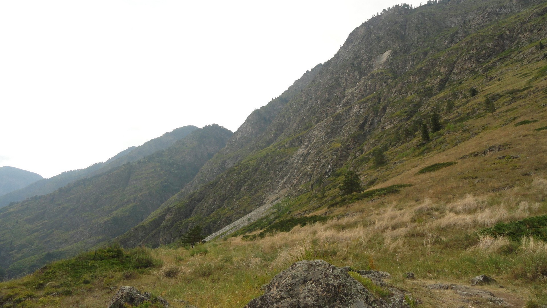 mountainous landscape with rocky slopes