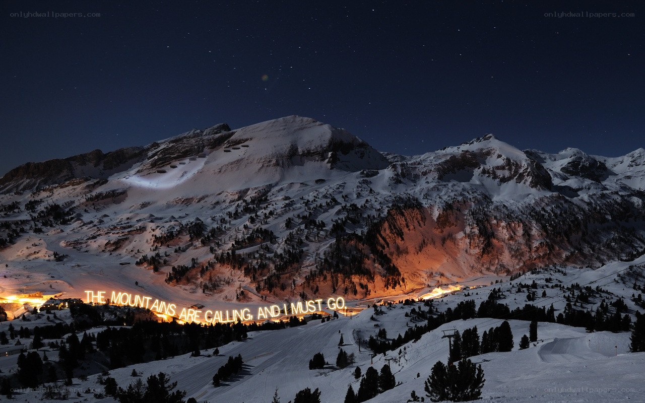 mountains at night with lights