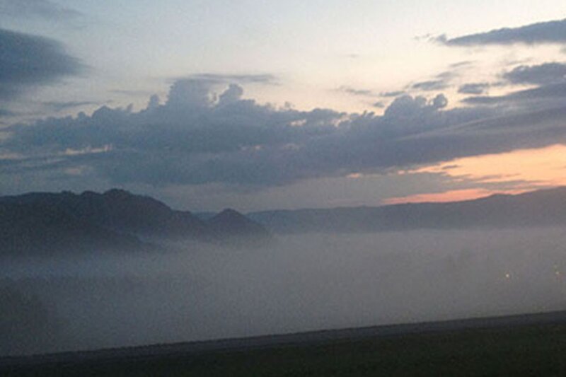 Mountains in Fog at Dusk