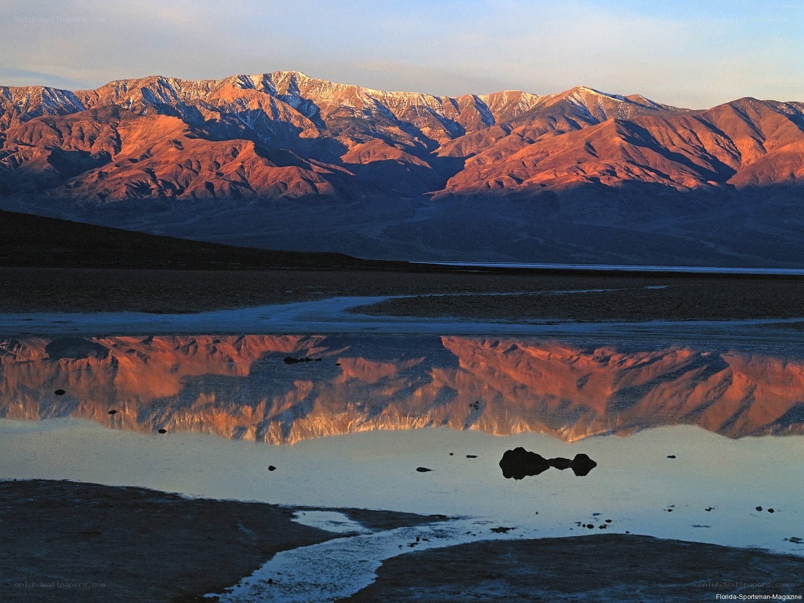 mountains reflected in water