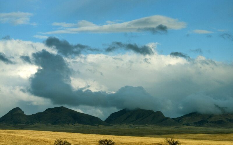 Mountains under Cloudy Sky — Blue, Dramatic, Afternoon