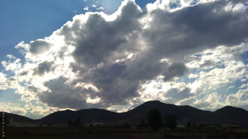 Mountains under Cloudy Sky — Blue
