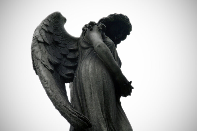 mourning angel statue