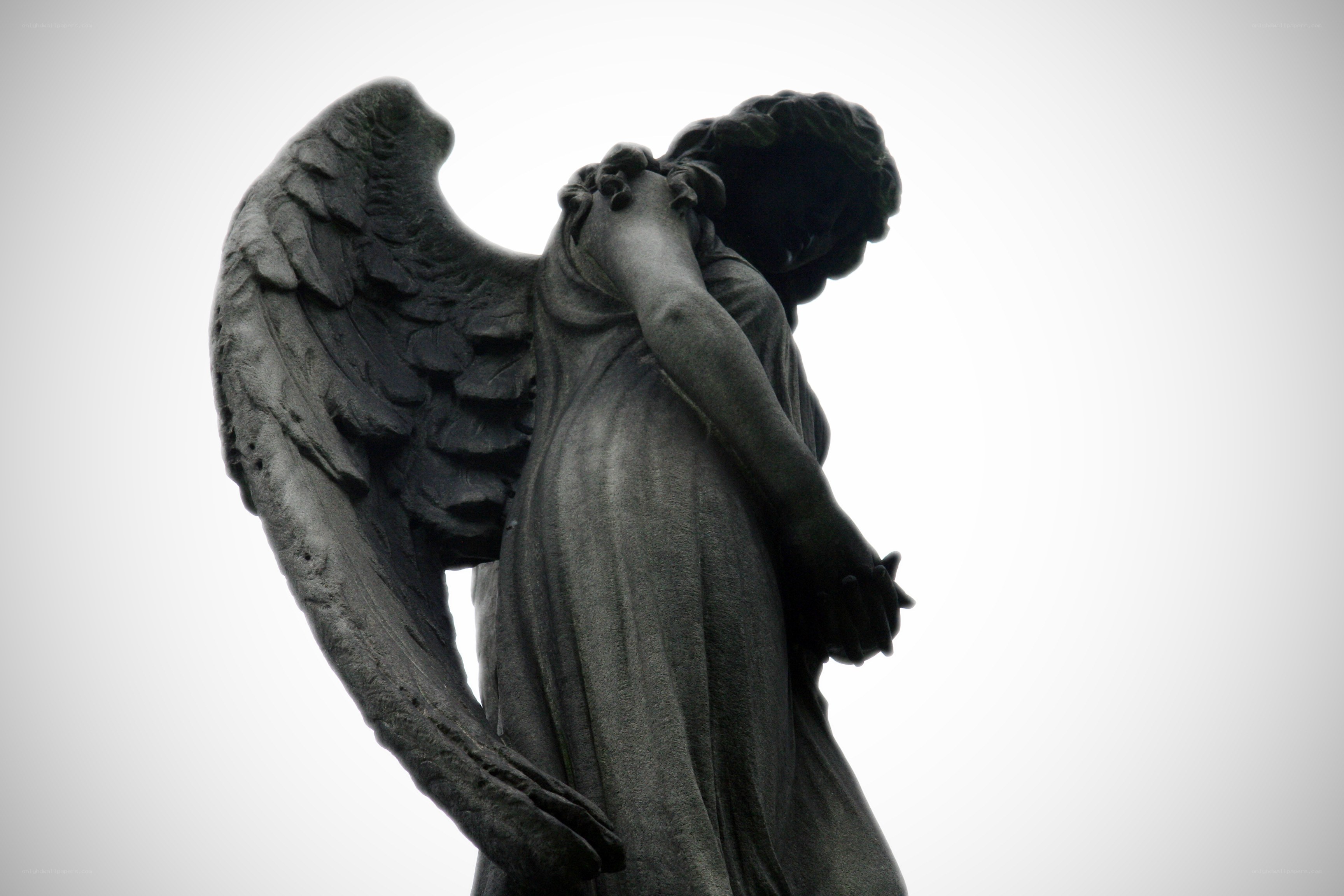 mourning angel statue