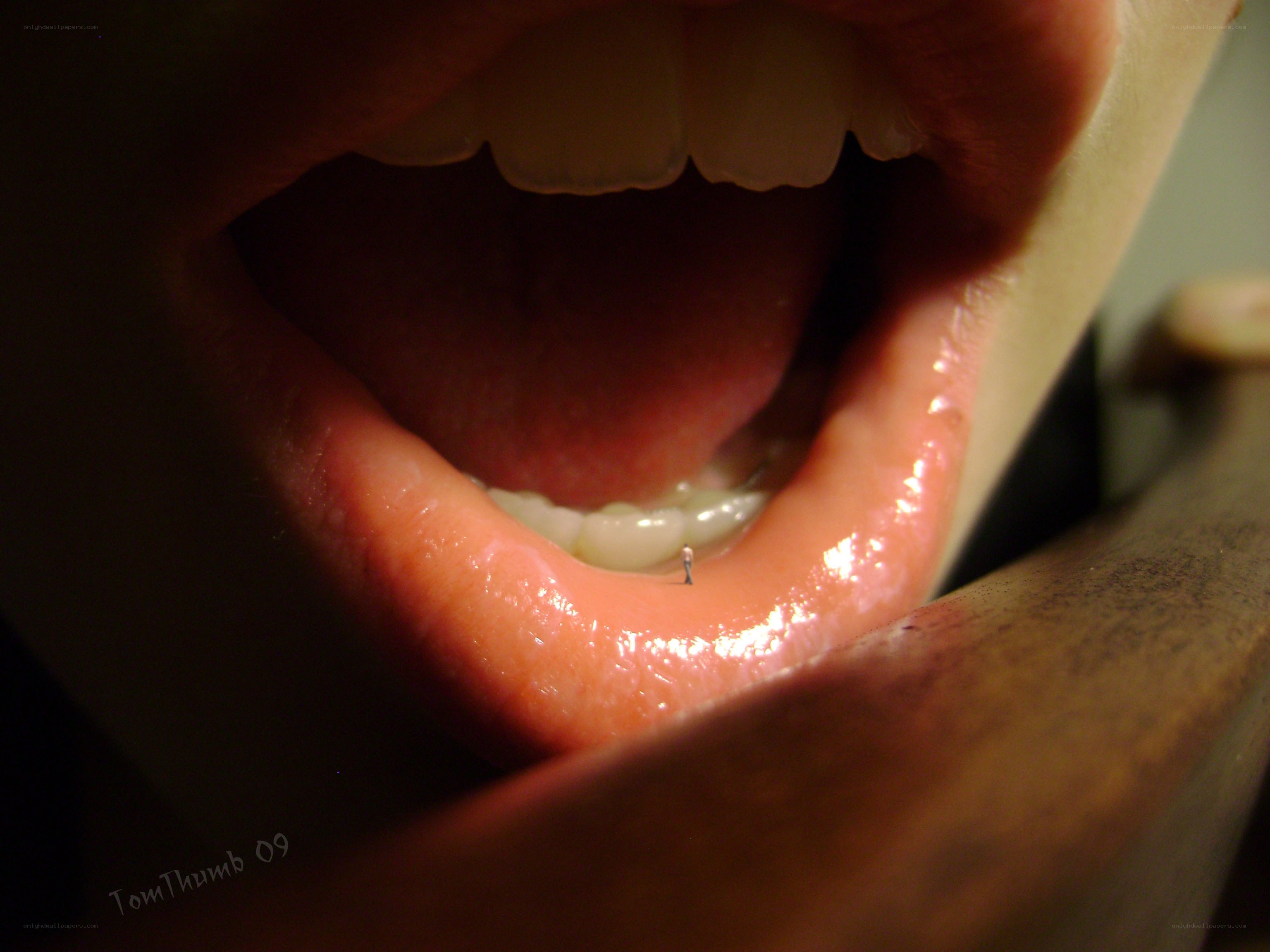 mouth with tiny figure