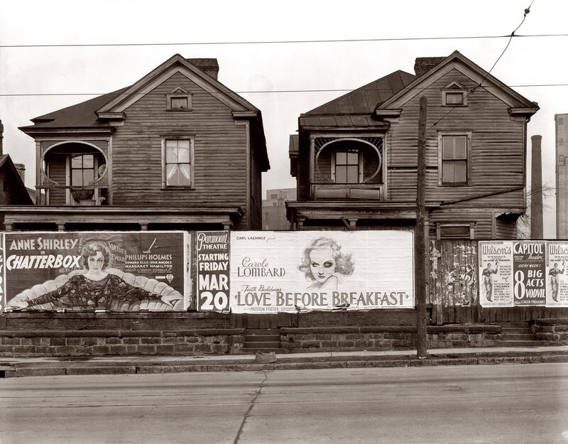 Movie posters on a city street