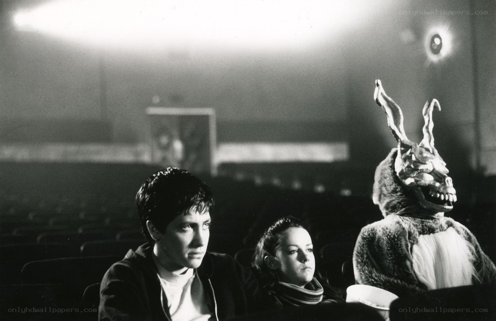 Movie theater scene with rabbit creature