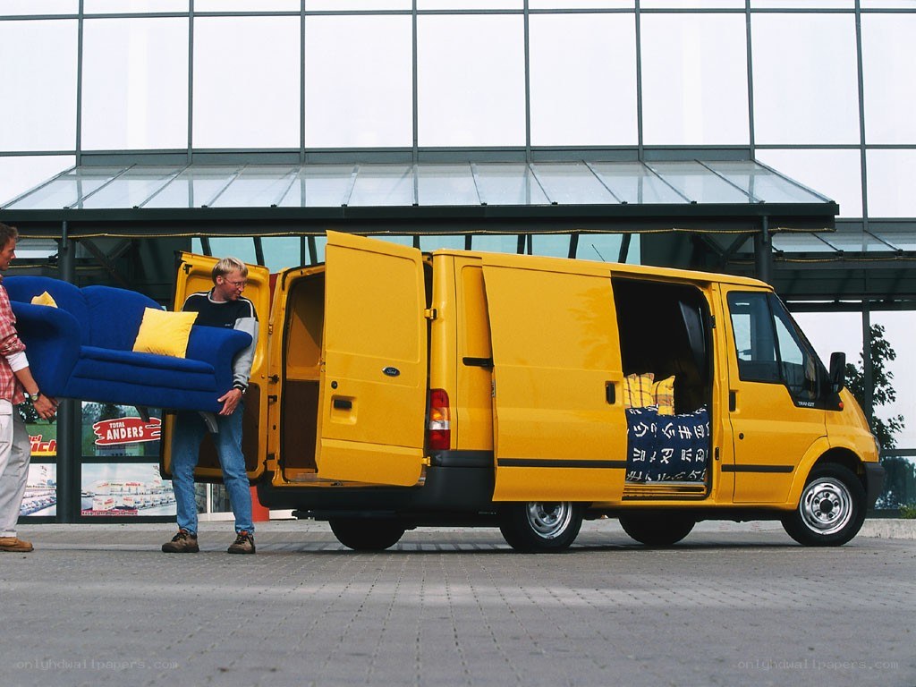 Moving a blue sofa with a yellow van