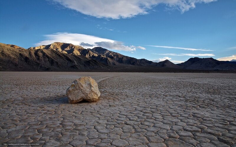 Moving rock in desert landscape