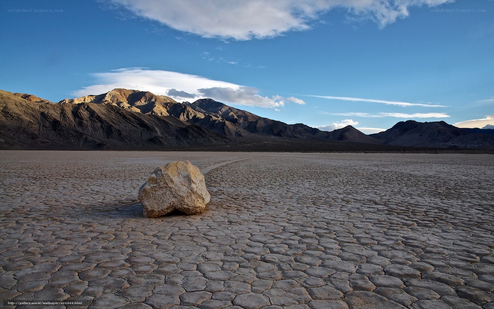 Moving rock in desert landscape