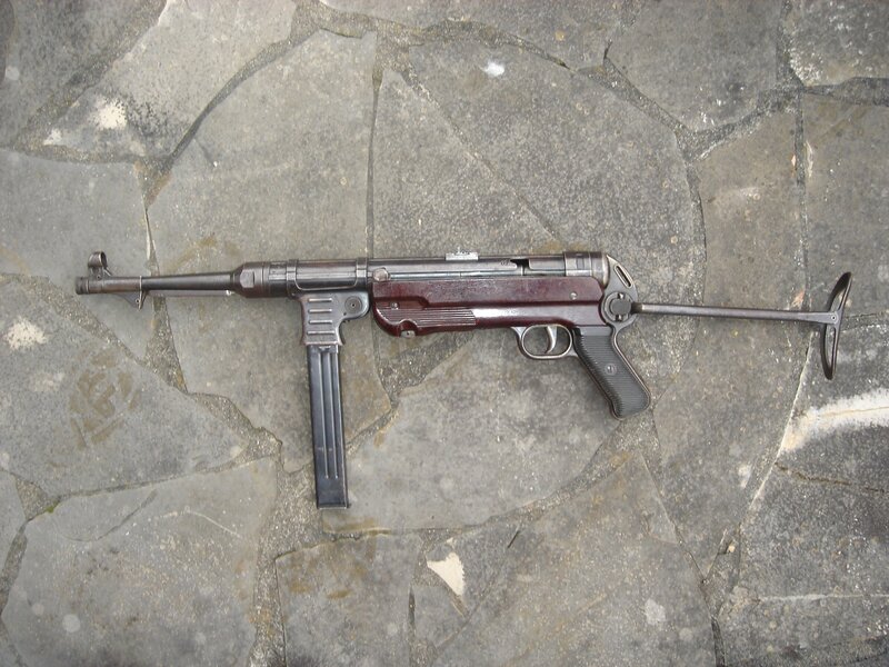 MP40 submachine gun on stone