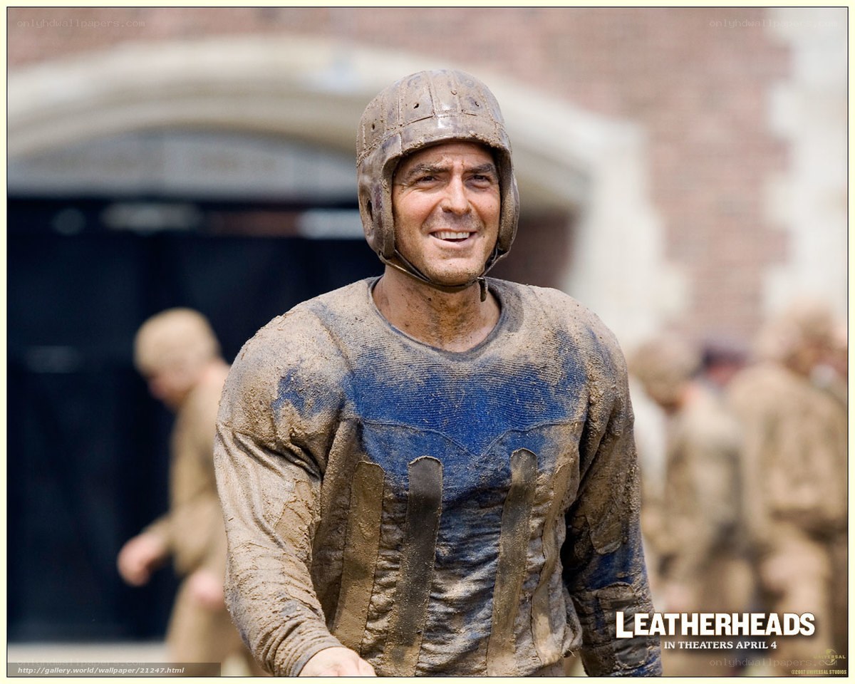 mud-covered football player