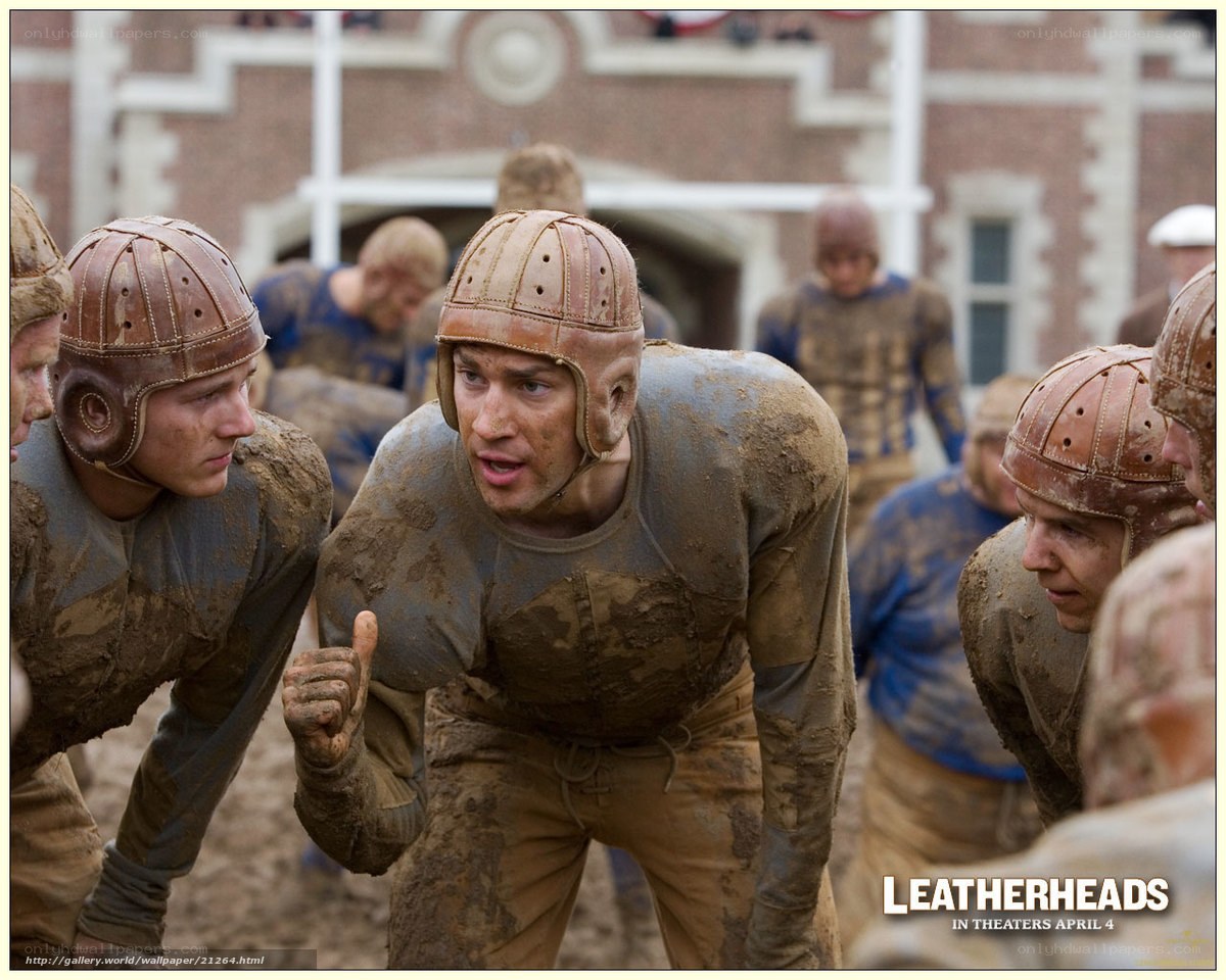 Mud-covered football players