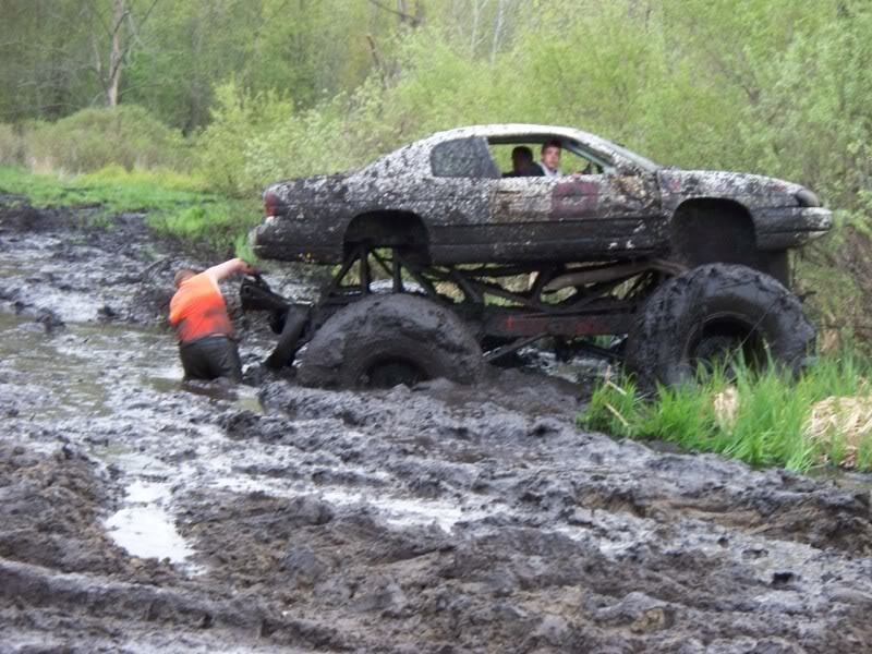 Mud-covered Monster Truck — Brown