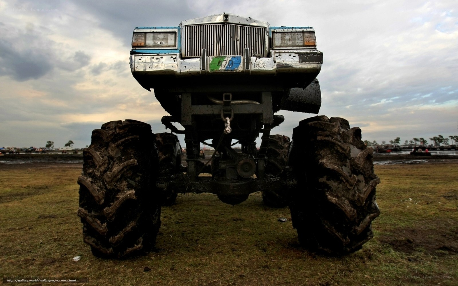 Mud-covered monster truck