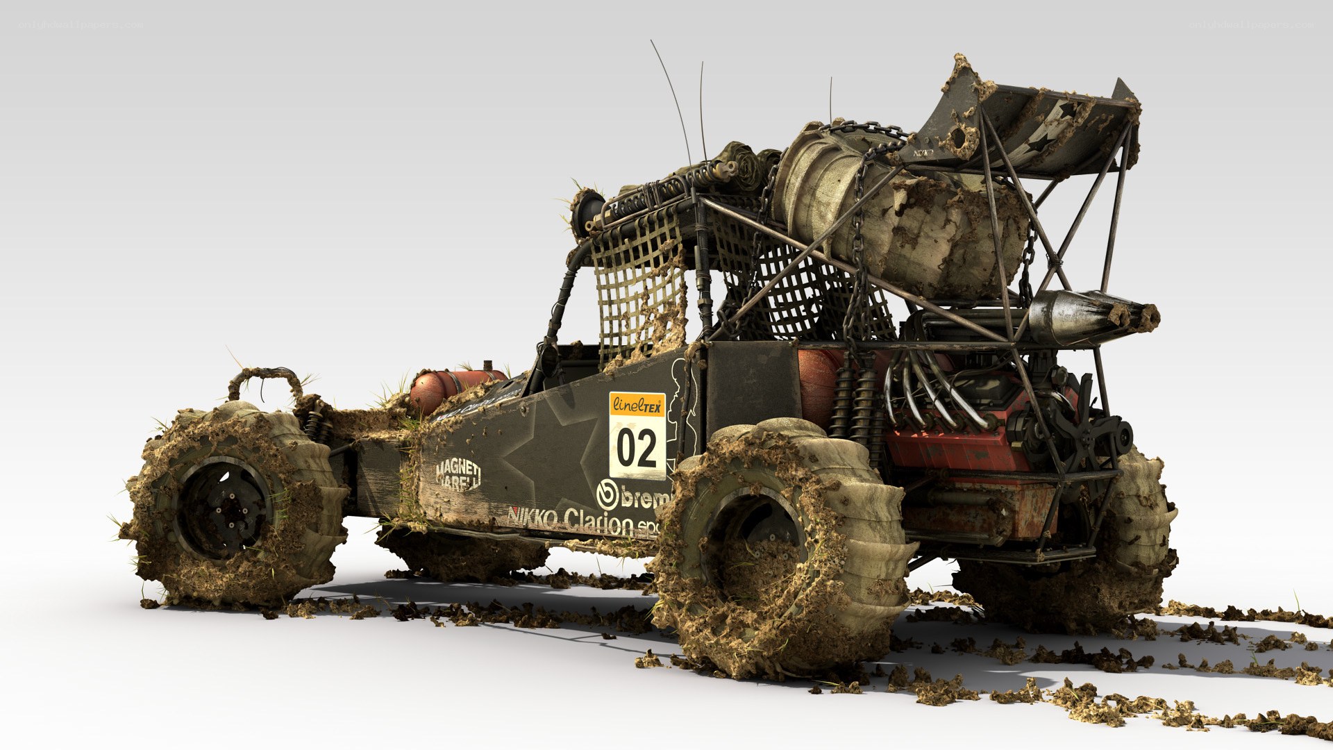 mud-covered off-road race car