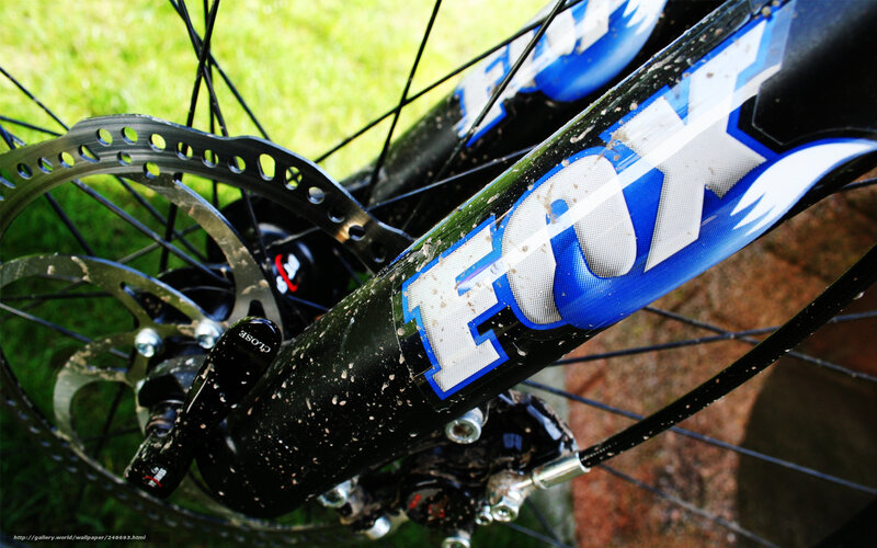 mud-splattered bike fork